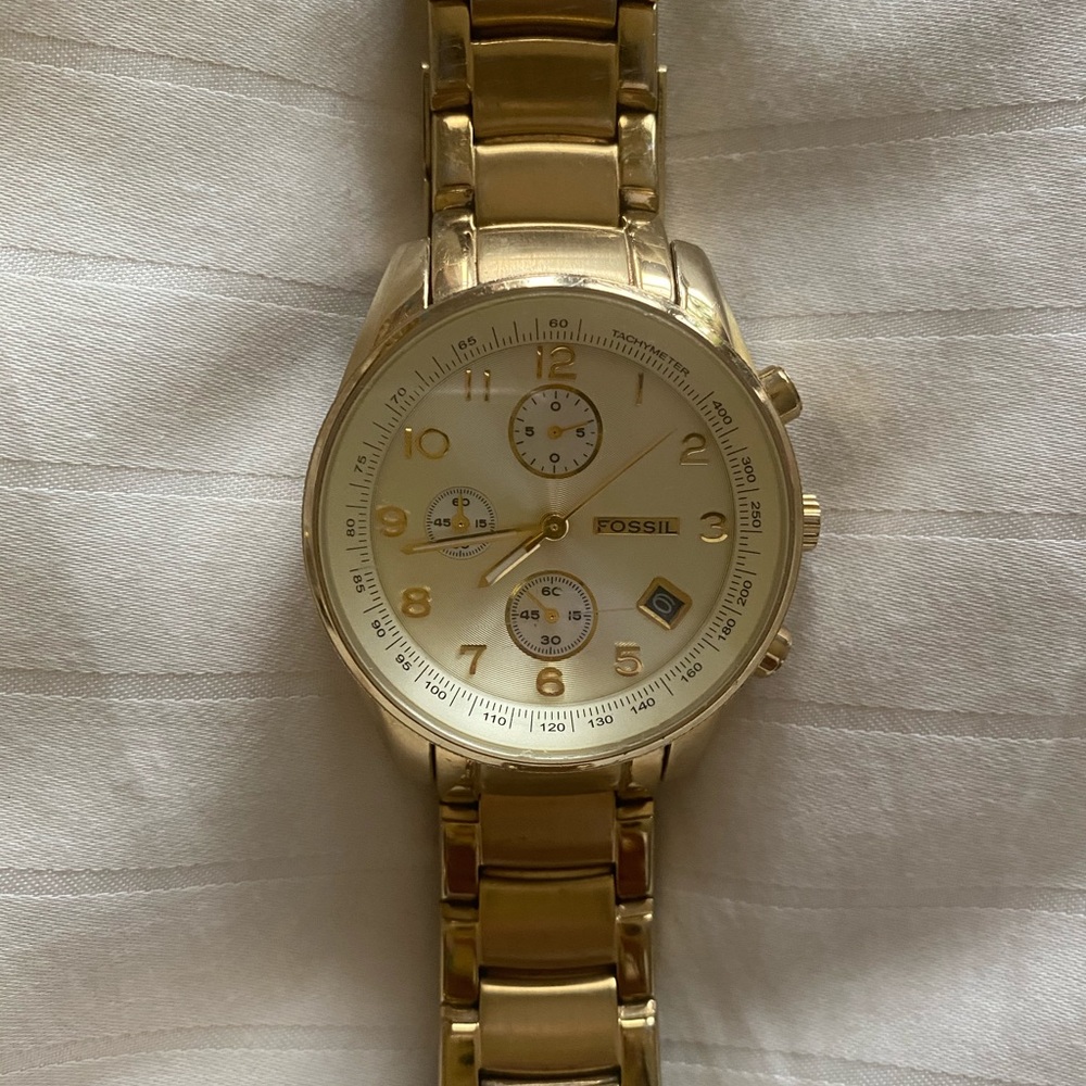 Gold Fossil watch